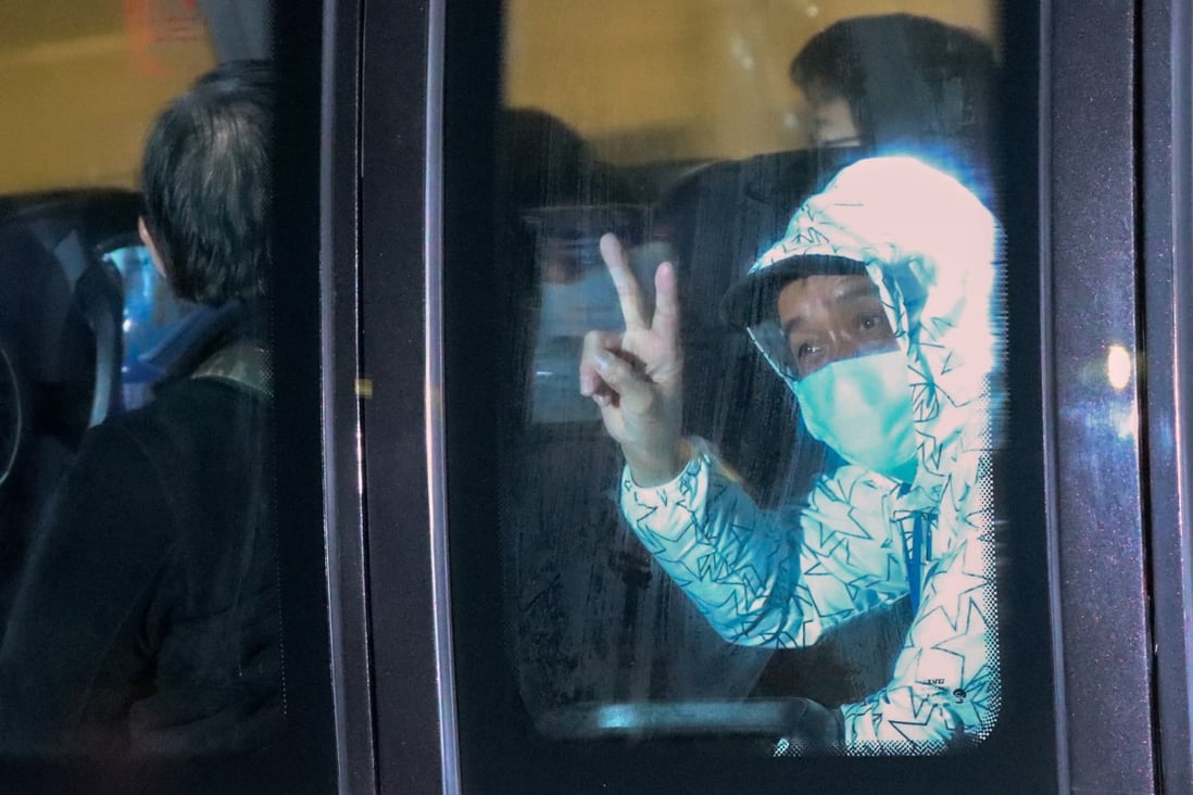 Hong Kong passengers from the Diamond Princess cruise ship arrive for quarantine at Chun Yeung Estate, Fo Tan. Photo: Felix Wong