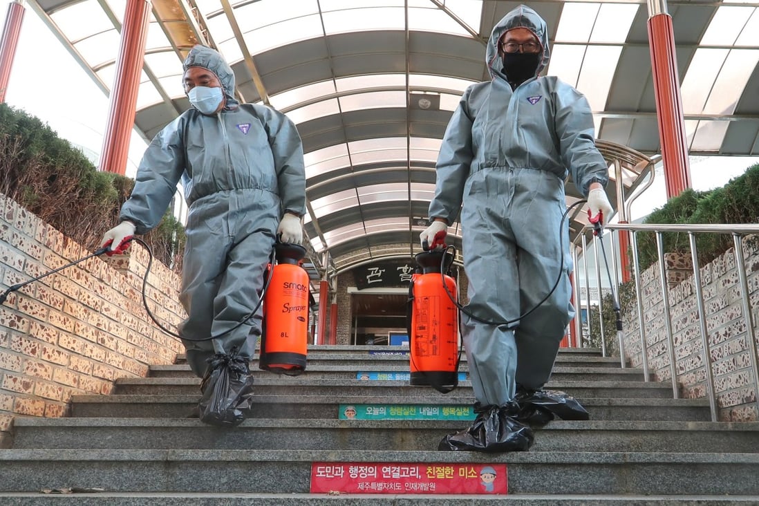 A disinfection operation at a research institute in South Korea, where coronavirus cases have surpassed the 1,000 mark. Photo: Xinhua