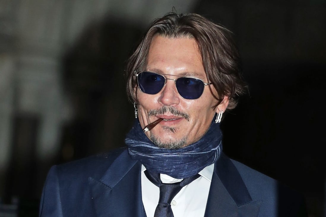 Actor Johnny Depp leaves the High Court in London on Wednesday after attending a hearing in his libel case against the publishers of The Sun and its executive editor, Dan Wootton. Photo: dpa