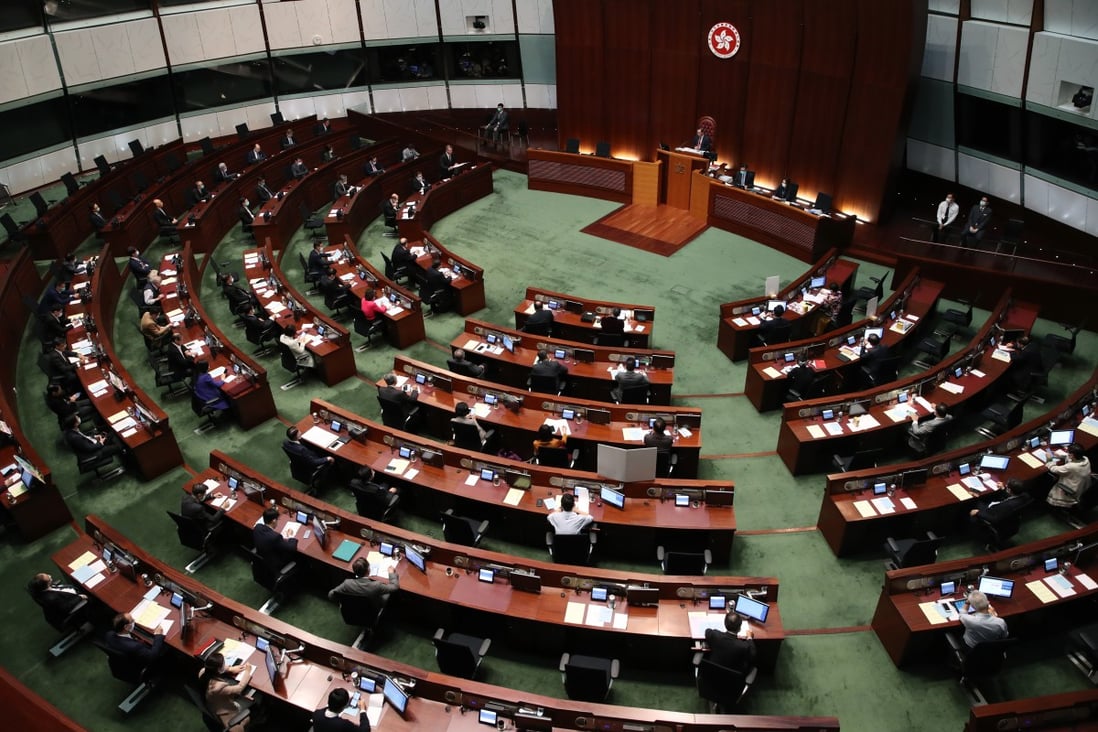 Financial Secretary Paul Chan delivers his budget speech in the Legislative Council chamber of Wednesday. Photo: Winson Wong