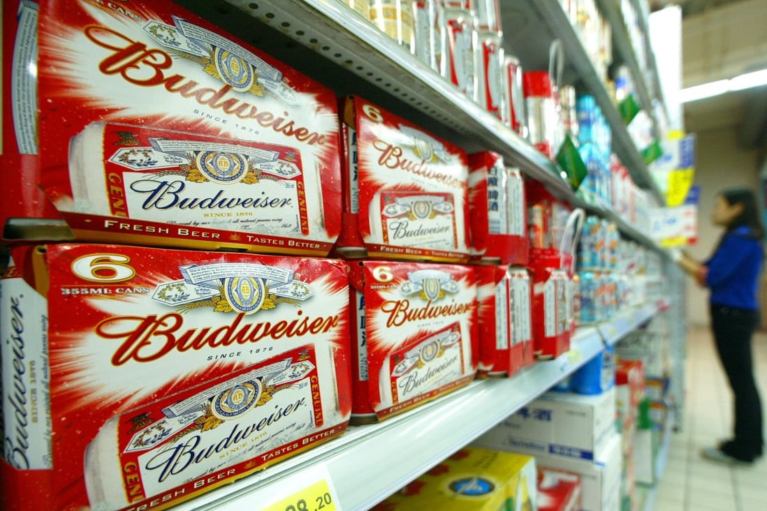 Packs of Budweiser beers are displayed in a Shanghai's supermarket. The brewer says on February 27 that there’s “almost no activity in the nightlife channel and very limited activity in restaurants.” Photo: AFP