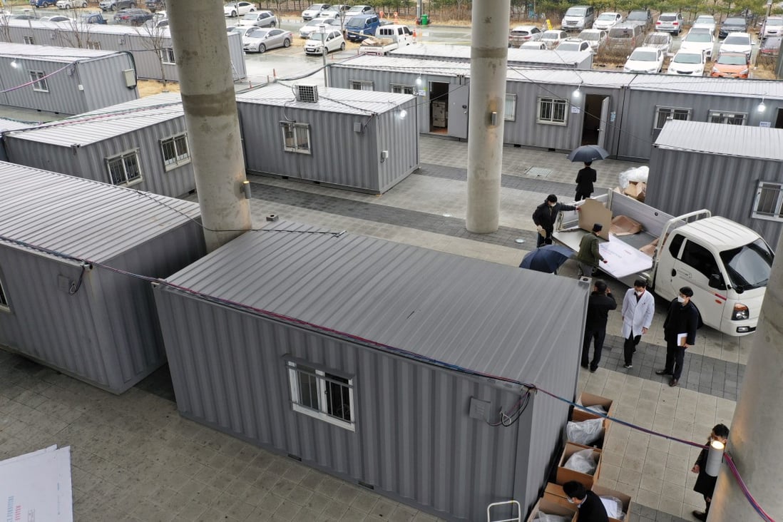 Containers have been set up as a makeshift medical facility on the grounds of a hospital in Daegu, the centre of South Korea’s coronavirus outbreak, as officials address the shortage of hospital beds in the city. Photo: EPA-EFE