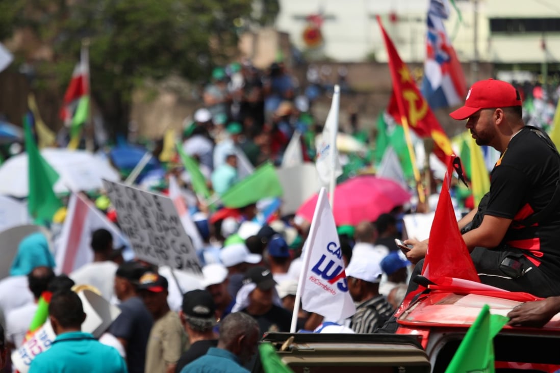 People participate in a mass march to protest the suspension of nationwide municipal elections last Sunday, in Santo Domingo. Photo: Reuters