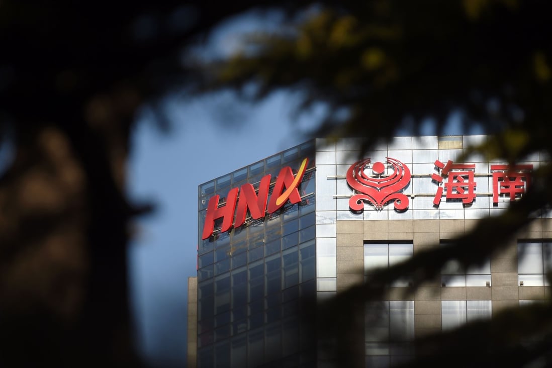 The HNA Group, which counts Hong Kong Airlines among its myriad assets, has been under intense pressure to repay debt that amounted to US$108 billion at its peak in 2018. Photo: AFP