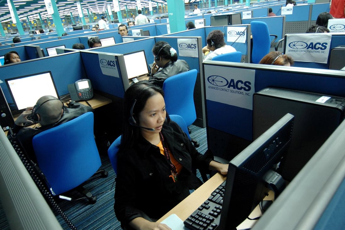 Agents attend to US clients at a call centre in Quezon City in Manila. The Philippines is preparing for the emergence of artificial intelligence technologies, which may threaten the business process outsourcing industry. Photo: AFP