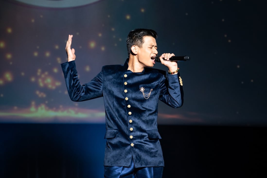 Filipino hospitality student Anjo Ferdinand Sarnate performing at the Karaoke World Championships in Tokyo last year.