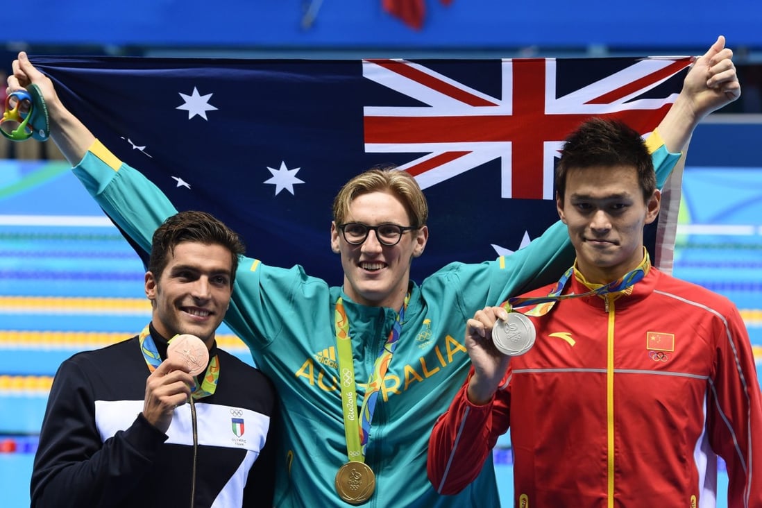 Gold medal winner Mack Horton with Sun Yang and Gabriele Detti of Italy after the men's 400m freestyle final at the 2016 Rio Olympics. Photo: EPA