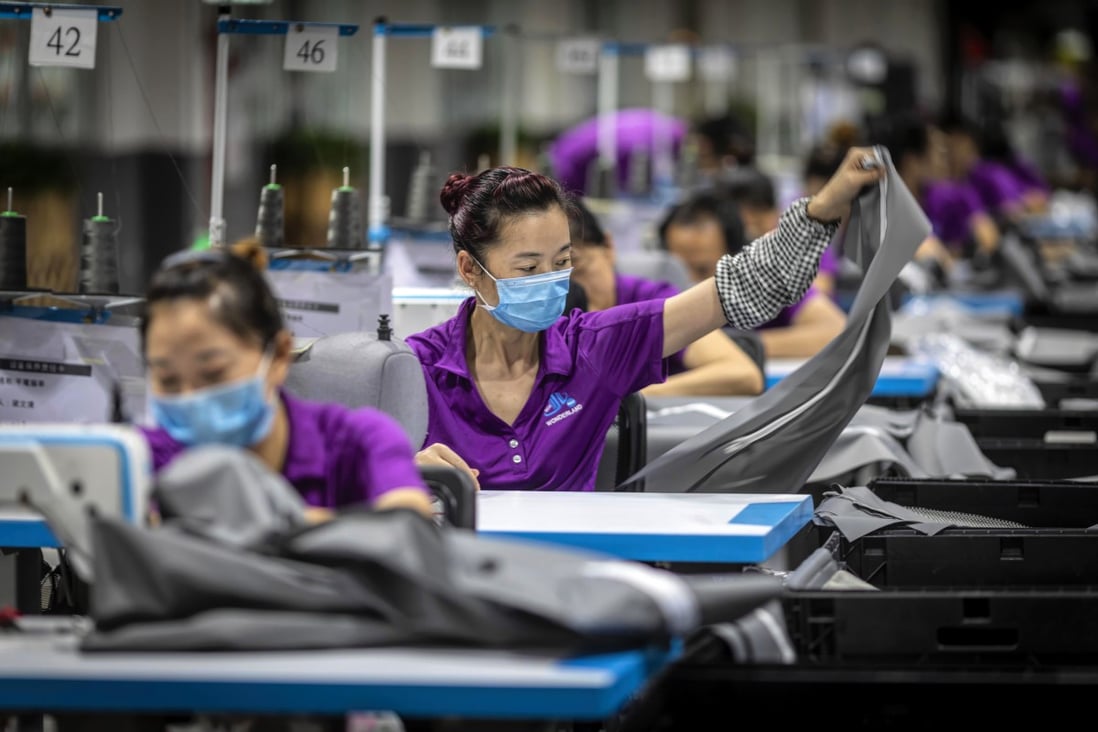 Women work at a nursery products company in Dongguan, in Guangdong province, China, in May 2019. Photo: EPA-EFE