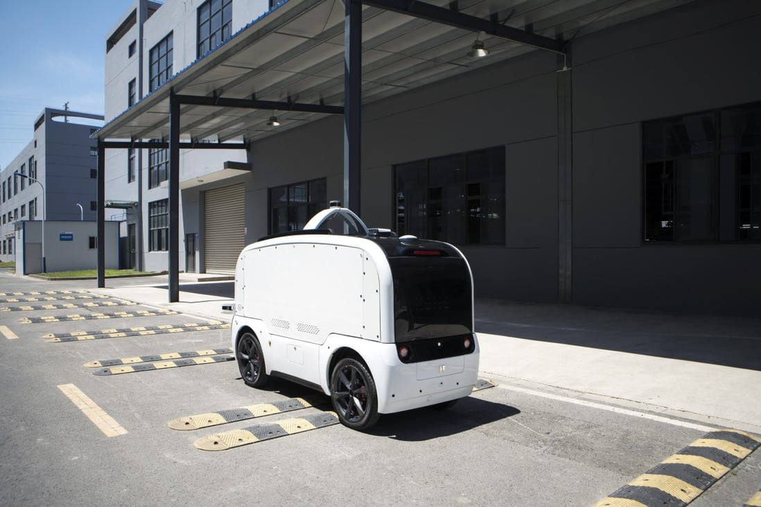 A Neolix autonomous vehicle travels over speed bumps during a test drive at the company's facility in Changzhou, Jiangsu province, China, on Friday, May 24, 2019. Photo: Bloomberg