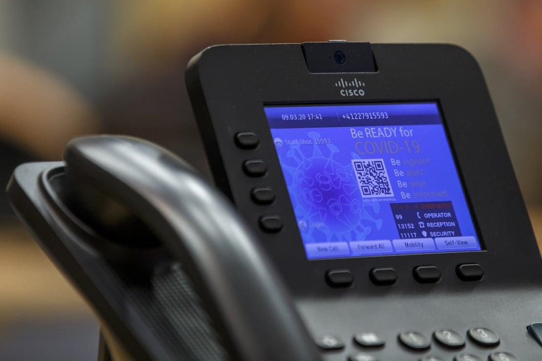 A phone with the message “Be ready for COVID-19” is pictured in the Strategic Health Operations Centre room during a press conference regarding the last updates on the novel coronavirus, at the World Health Organisation (WHO) headquarters in Geneva on March 9. Photo: EPA-EFE