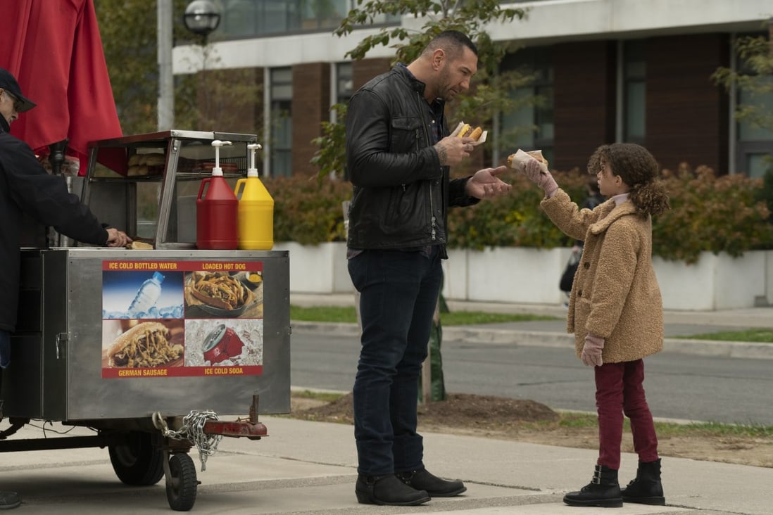 Dave Bautista and Chloe Coleman in a still from My Spy (category: IIA), directed by Peter Segal.
