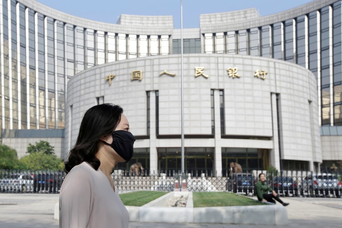 China’s new loans stood at 906 billion yuan (US$130 billion) in February, down sharply from a record 3.34 trillion yuan (US$480 billion) in January. Photo: Reuters
