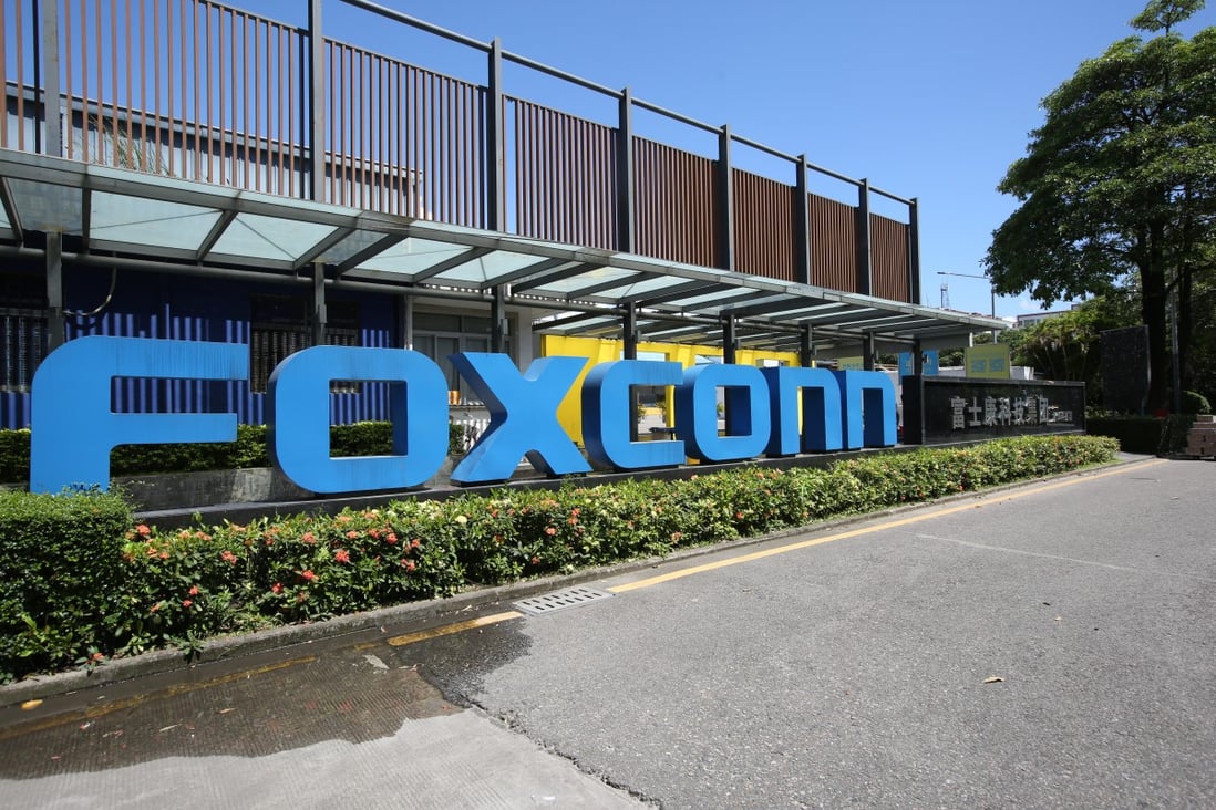 The logo of Foxconn Technology Group, the main assembler of Apple’s iPhones, is seen at the facade of its manufacturing complex in the Longhua district of Shenzhen, in southern Guangdong province. Photo: Nora Tam