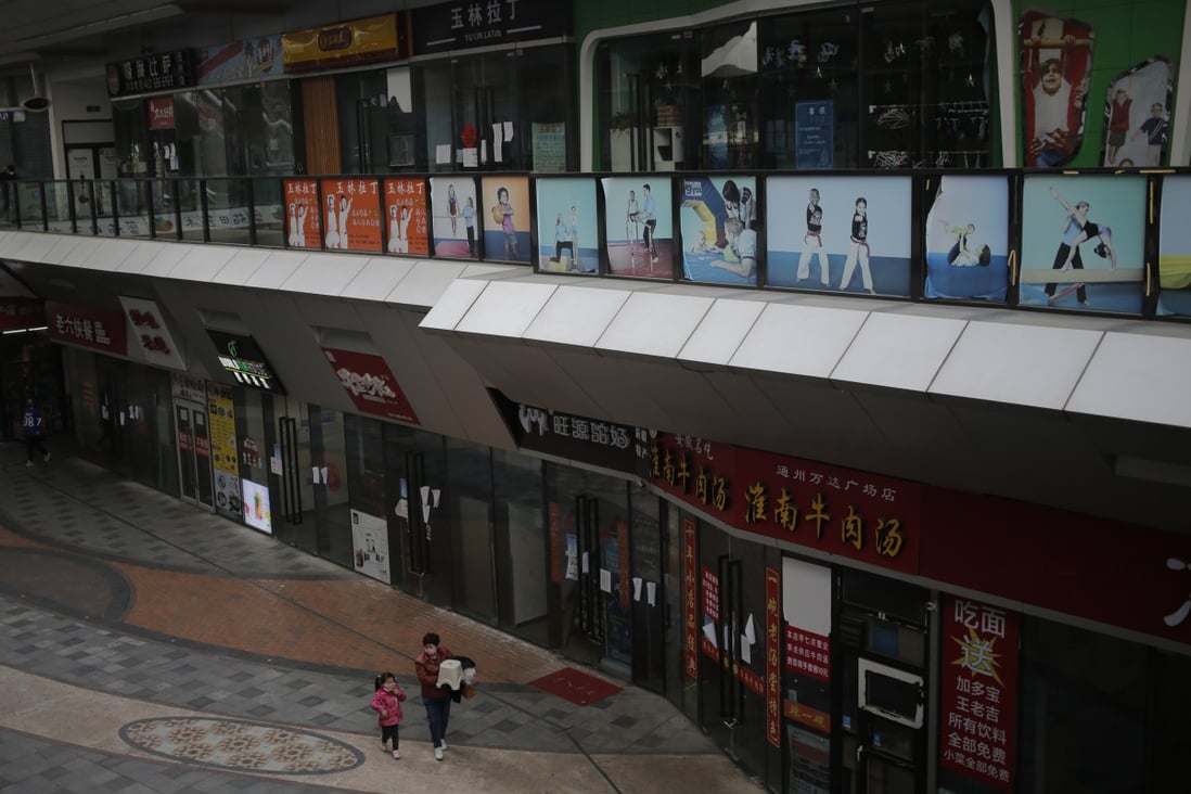 View of a semi-deserted commercial street in Beijing on March underscores the financial distress experienced by a majority of respondents in Hurun survey. Photo: EPA-EFE