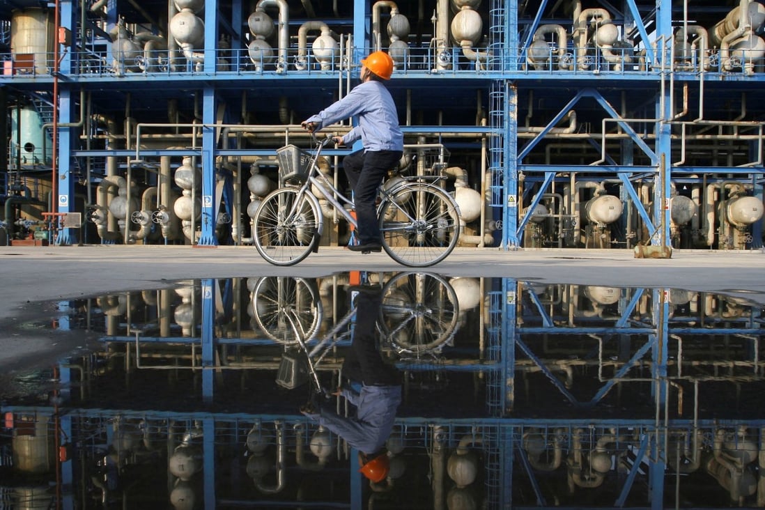 An engineer checks pipelines at an oil refinery of China National Petroleum Corp (CNPC) in Lanzhou, Gansu province. Photo: Reuters