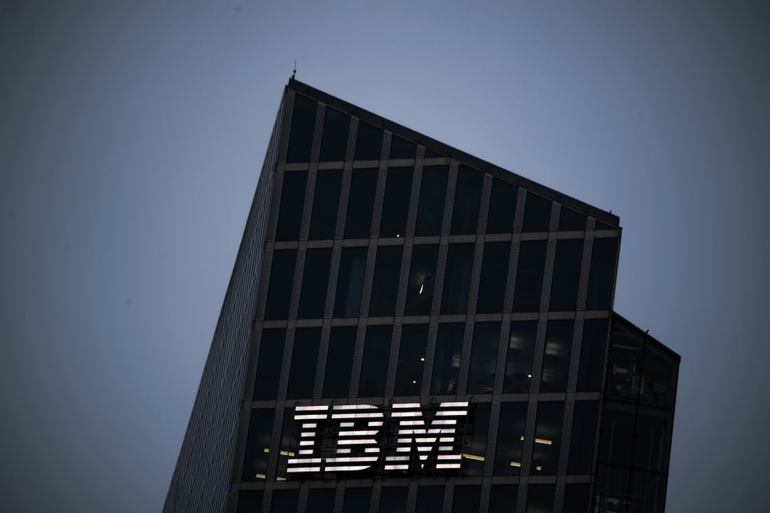 A logo sits illuminated on the IBM Watson cognitive computing platform Internet of Things (IoT) center, at the IoT center in Munich, Germany. Photo: Bloomberg