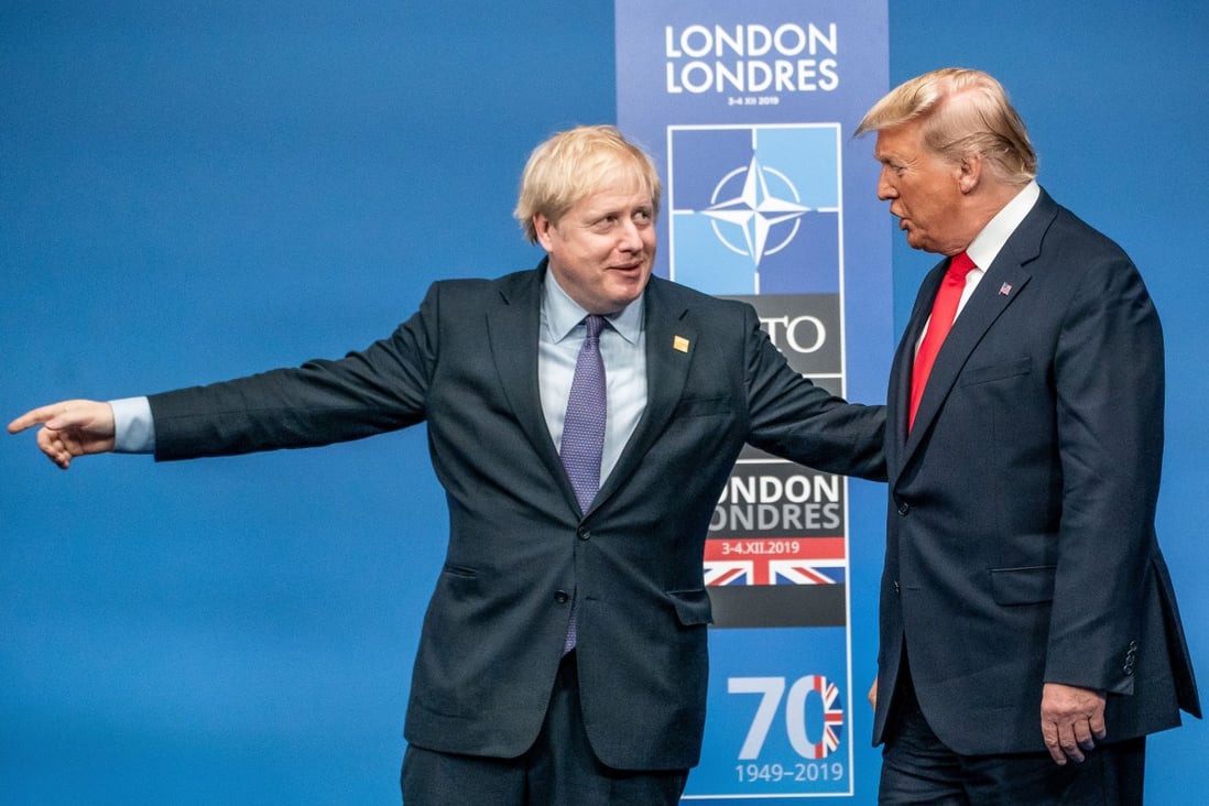 British Prime Minister Boris Johnson (left) welcomes US President Donald Trump, before the start of a round table meeting during the annual Nato Leaders Summit in Waterford, England, on December 4, 2019. Photo: DPA