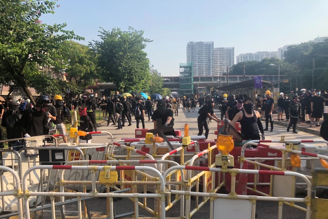 Protesters set up a roadblock in Hong Kong’s Tuen Mun area during a September 21 protest. First aid volunteer Ng Hei-lun was arrested at the protest and charged with possession of an unlicenced walkie-talkie. Photo: Sam Tsang