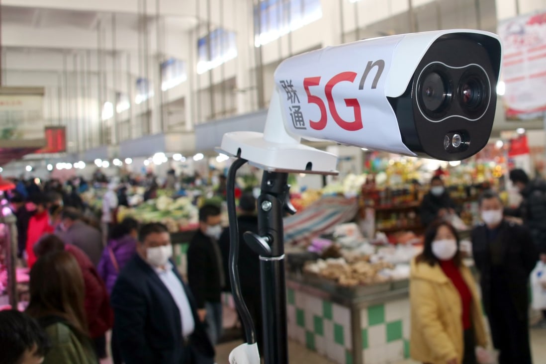 A new thermal temperature detector using 5G is pictured scanning customers at a market in Wuzhong district, Suzhou city, China’s Jiangsu province, on Thursday Feb. 20, 2020. HANDOUT