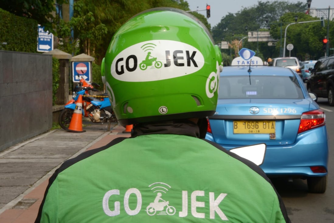 Motorcycle driver with Indonesian start-up Gojek on June 11, 2015. Photo: AFP