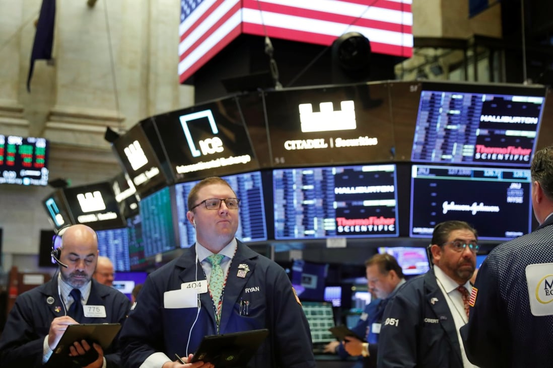 Traders at the New York Stock Exchange on Tuesday. Photo: Reuters