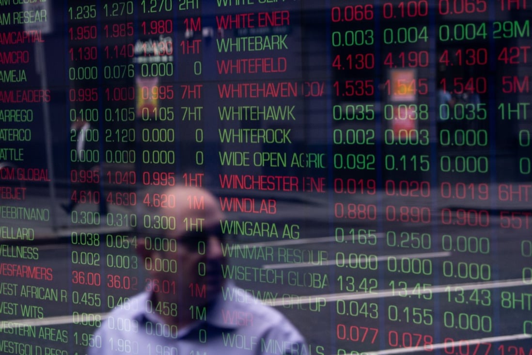 Australian stock prices are displayed on a digital board in Sydney. Photo: EPA/EFE