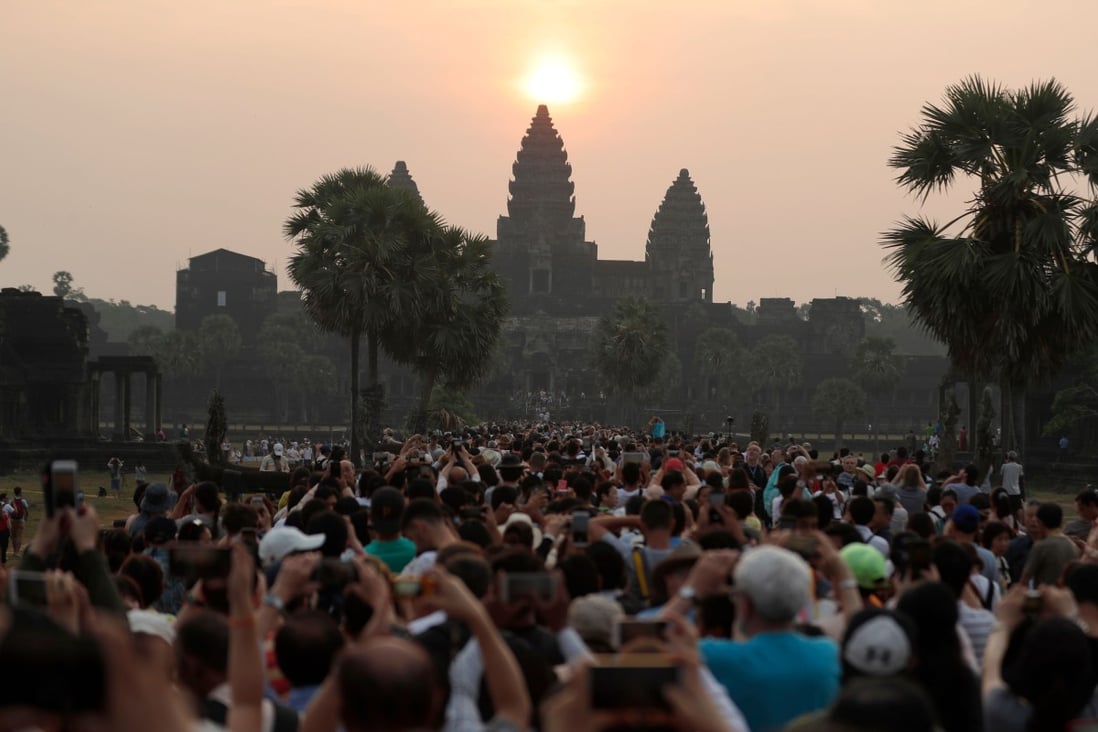 Angkor Wat in 2018. Today the crowds are gone, but they will return after the pandemic has passed. Photo: AFP via Getty Images