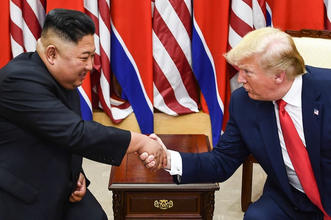 North Korean leader Kim Jong-un and US President Donald Trump shake hands during a meeting in June 2019. Photo: AFP