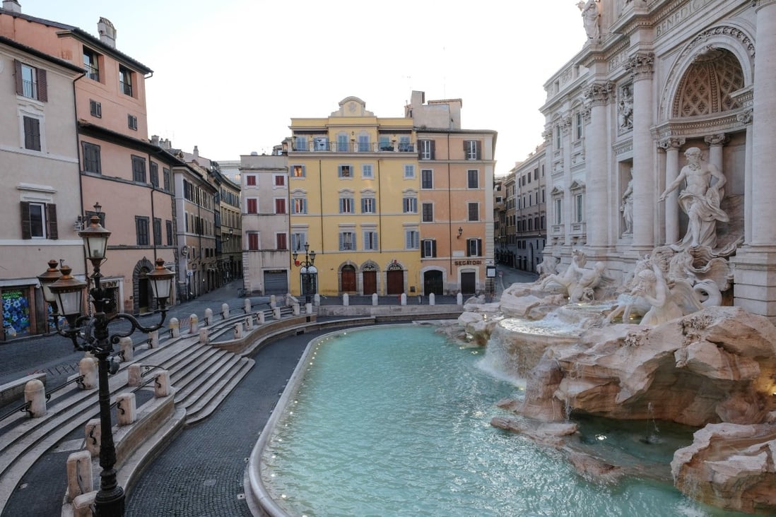 The Trevi Fountain in Rome, deserted Monday during Italy’s coronavirus lockdown. The death toll of 601 in the previous 24 hours was a decline from the weekend. Photo: EPA-EFE via ANSA