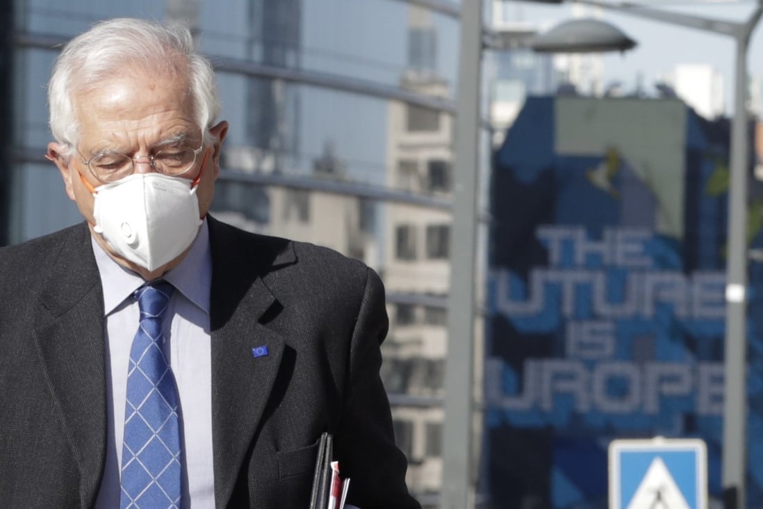 The European Union’s foreign policy chief Josep Borrell wears a face mask as he heads to a meeting in Brussels on Monday. Photo: EPA-EFE