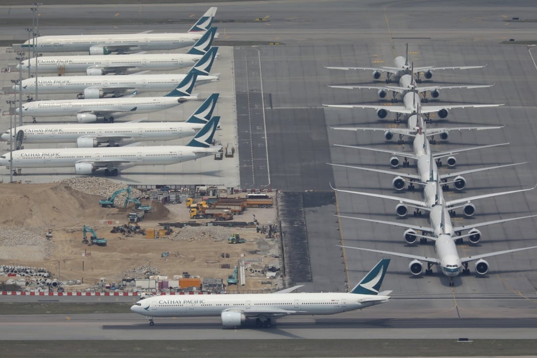 Aircraft sit parked on the tarmac at Hong Kong International Airport. Photo: Robert Ng