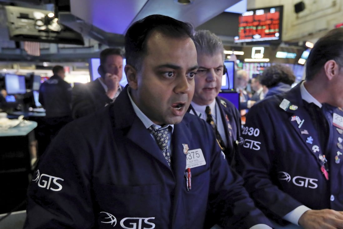 Worried faces at the New York Stock Exchange on March 9. Photo: AP