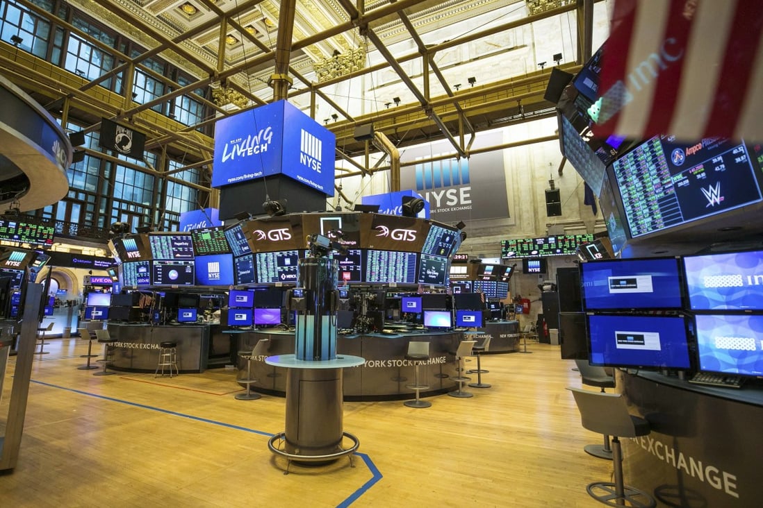 The New York Stock Exchange trading floor is shown without its traders on Tuesday. It is closed temporarily for the first time in 228 years as a result of coronavirus concerns. Photo: NYSE via AP