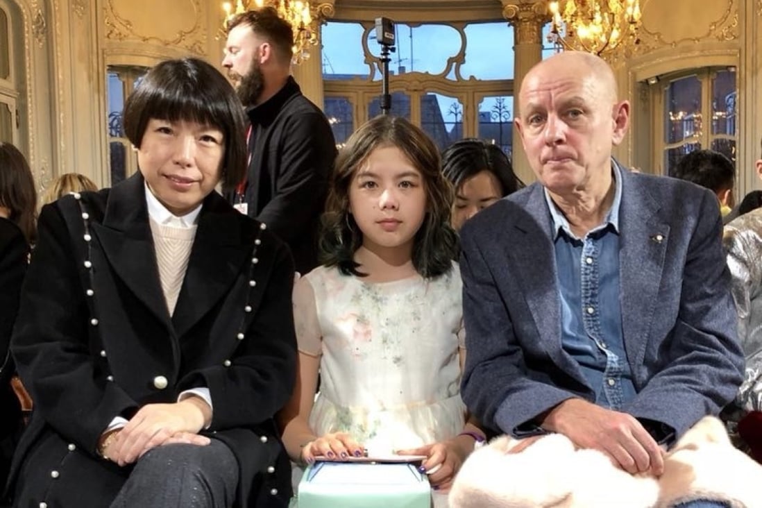 (From left) Angelica Cheung, Hayley Graham and Mark Graham sitting front row at a Huishan Zhang show in London.