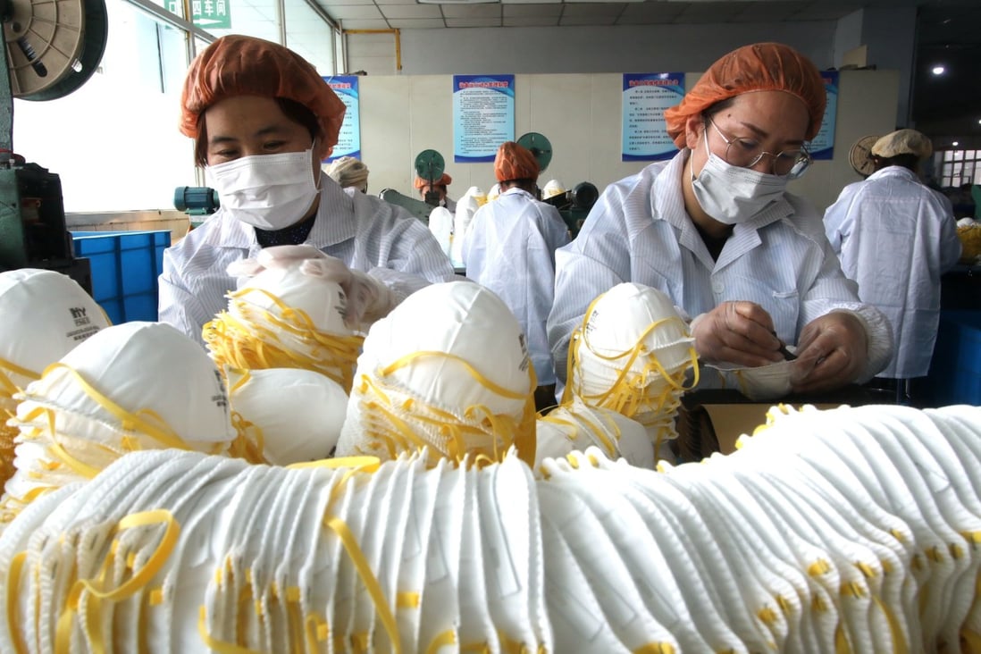In early March, China’s daily output of face masks reached 116 million units. Photo: Xinhua