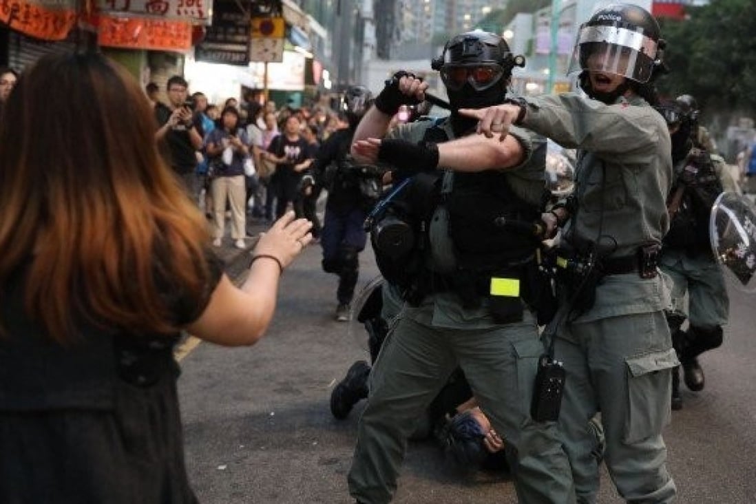 Police using pepper spray during an anti-government protest in Tuen Mun in November. Photo: Handout