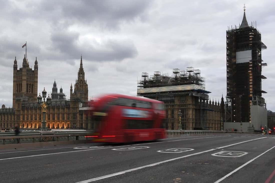 A bus drives along an otherwise deserted Westminster Bridge in London, where about 180 students from China are preparing to return home on a special flight organised by the Chinese government. Photo: AP
