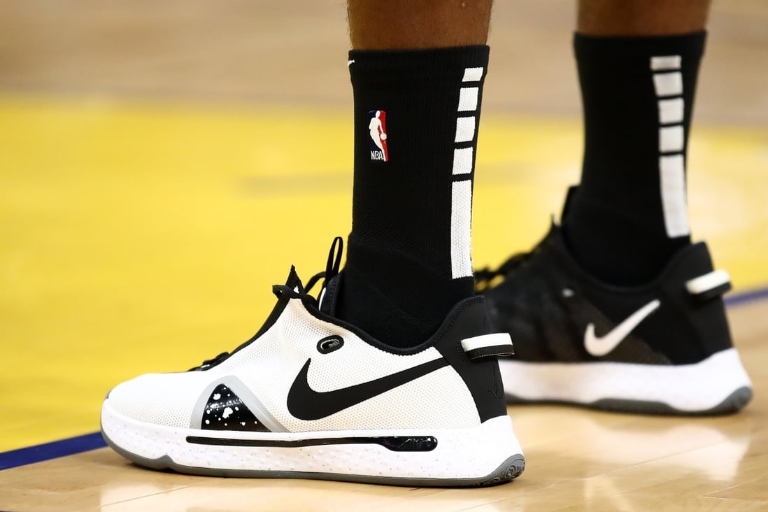 A close up of the Nike trainers worn by Paul George of the LA Clippers during an NBA game on March 10. This week the company reported digital sales climbed more than 30 per cent in Greater China in the third quarter. Photo: AFP