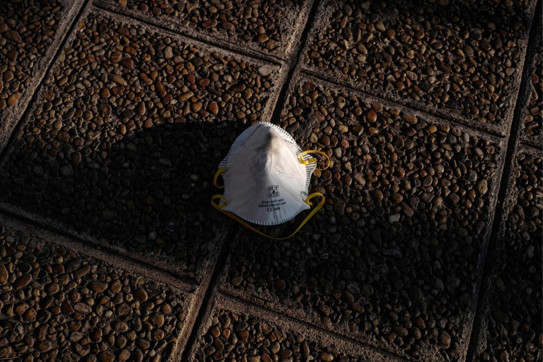 A mask lays on a street in the city of Nice, southern France. Photo: AFP
