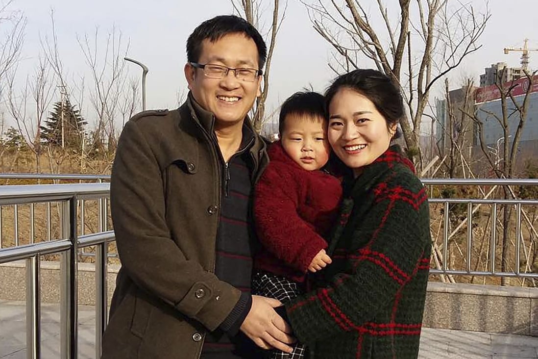 Wang Quanzhang (left) and his wife Li Wenzu with their son in 2015. Photo: AP