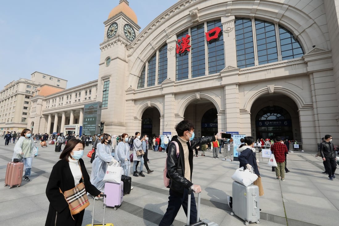 Passengers leaving Wuhan city are pictured at the Hankou Railway Station in Wuhan city, central China's Hubei province, on Wednesday morning, April 08, 2020. Photo: SCMP/Simon Song