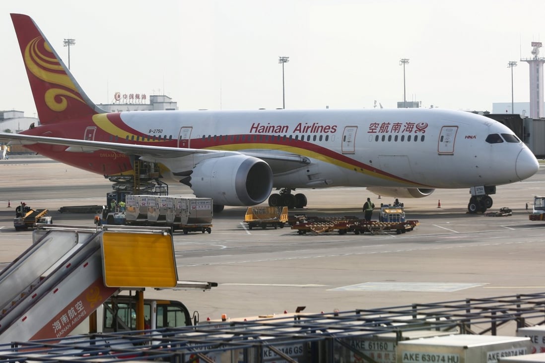 A Hainan Airlines aircraft sits on the tarmac at the airport in Beijing. Photo: Reuters