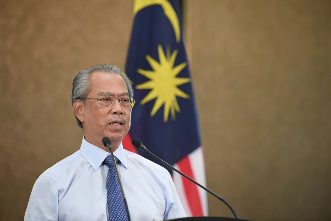 Malaysian Prime Minister Muhyiddin Yassin announces the new measures during a press conference at the Prime Minister’s Building. Photo: DPA