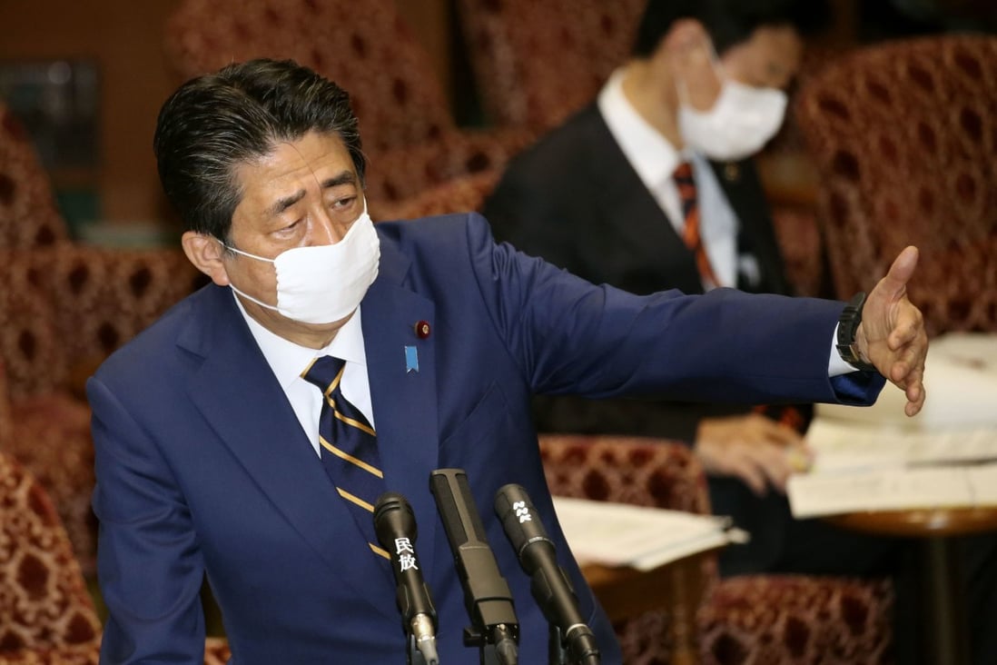 Japanese Prime Minister Shinzo Abe attends a parliamentary session in Tokyo, before declaring a state of emergency in the capital and other big cities in view of a recent surge in coronavirus infections. Photo: Kyodo