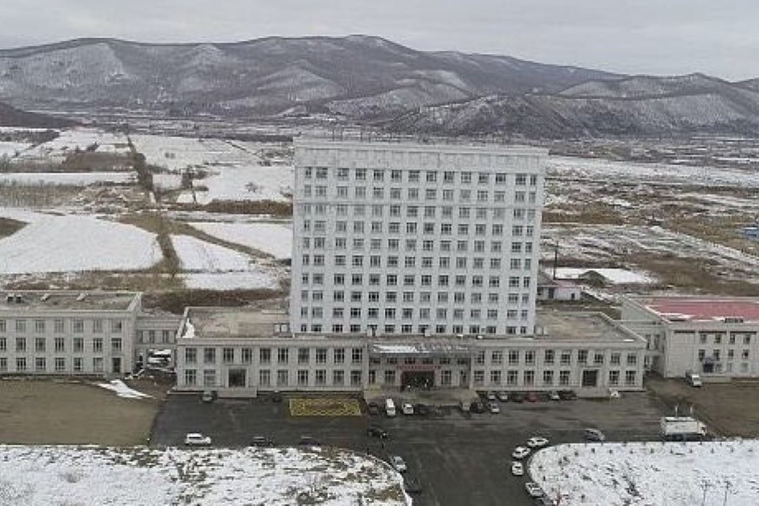 A 13-storey office building in Suifenhe, Heilongjiang province, is being converted into a hospital, which will have 600 beds when it opens on April 11. Photo: Handout
