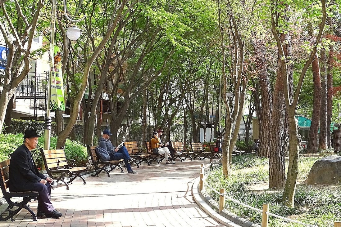 People relax at a park in Daegu. Photo: Grace Moon