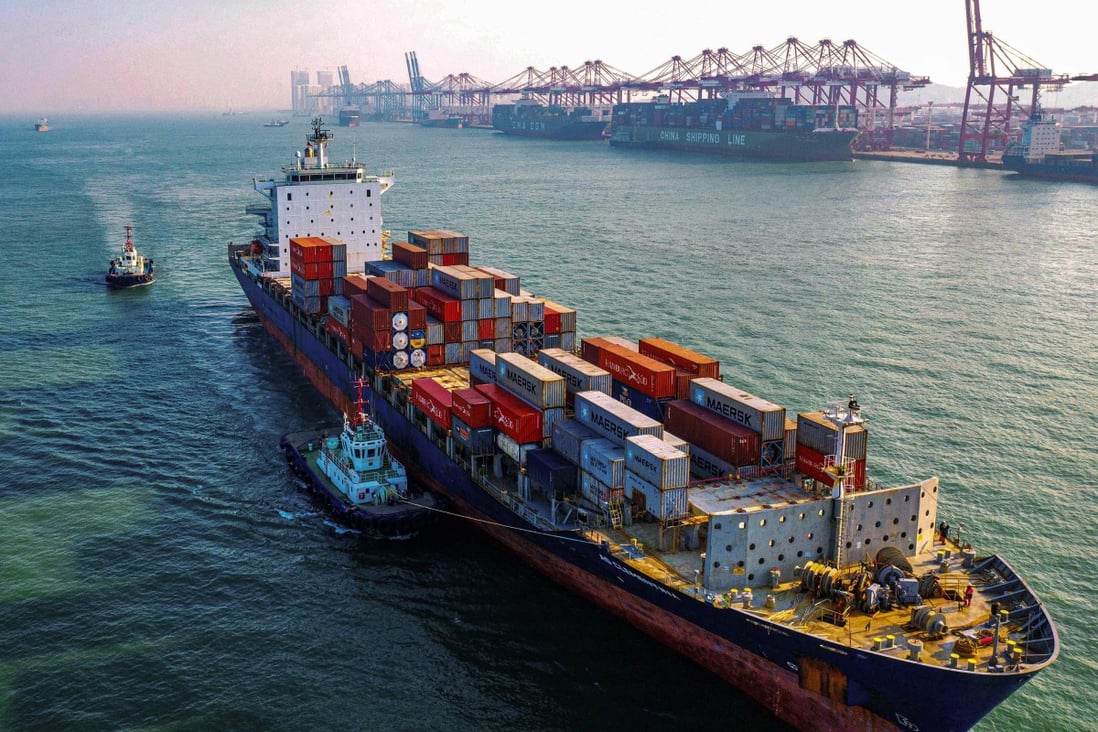 A container ship makes its way to Qingdao port in China’s eastern Shandong province. The WTO said on Wednesday that global trade is set to plunge between 13 and 32 per cent this year as the Covid-19 pandemic upends the world economy. Photo: AFP