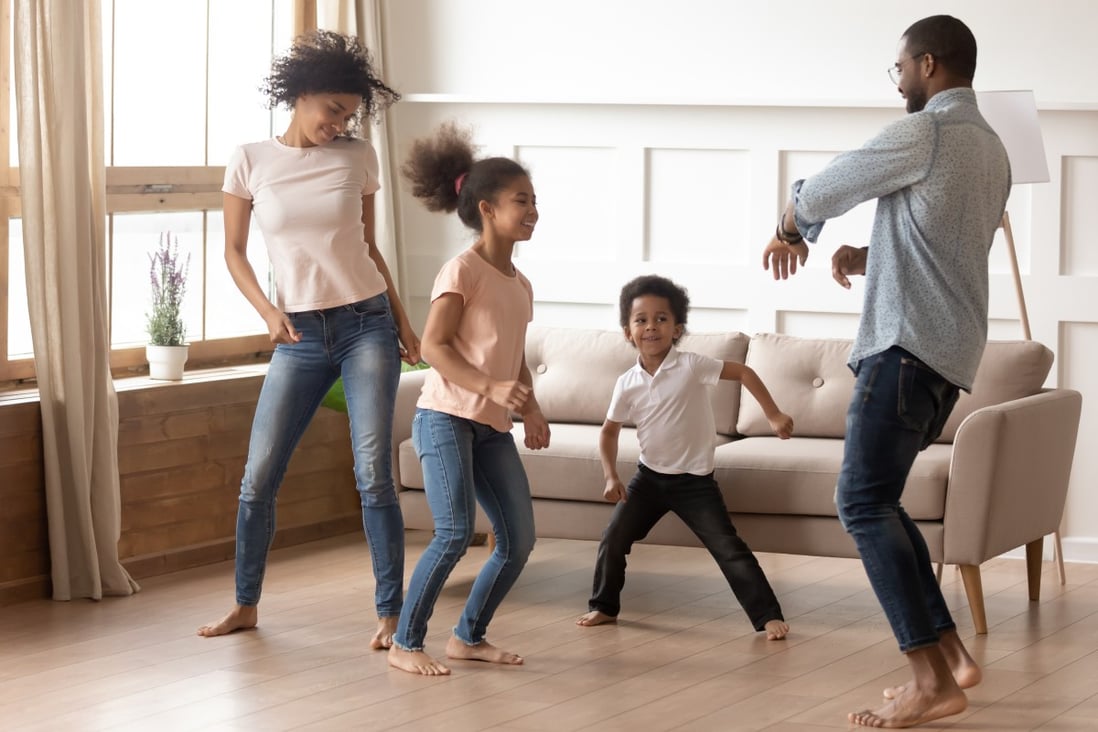 Dancing at home together as a family is one way to keep the coronavirus quarantine blues at bay. Photo: Shutterstock