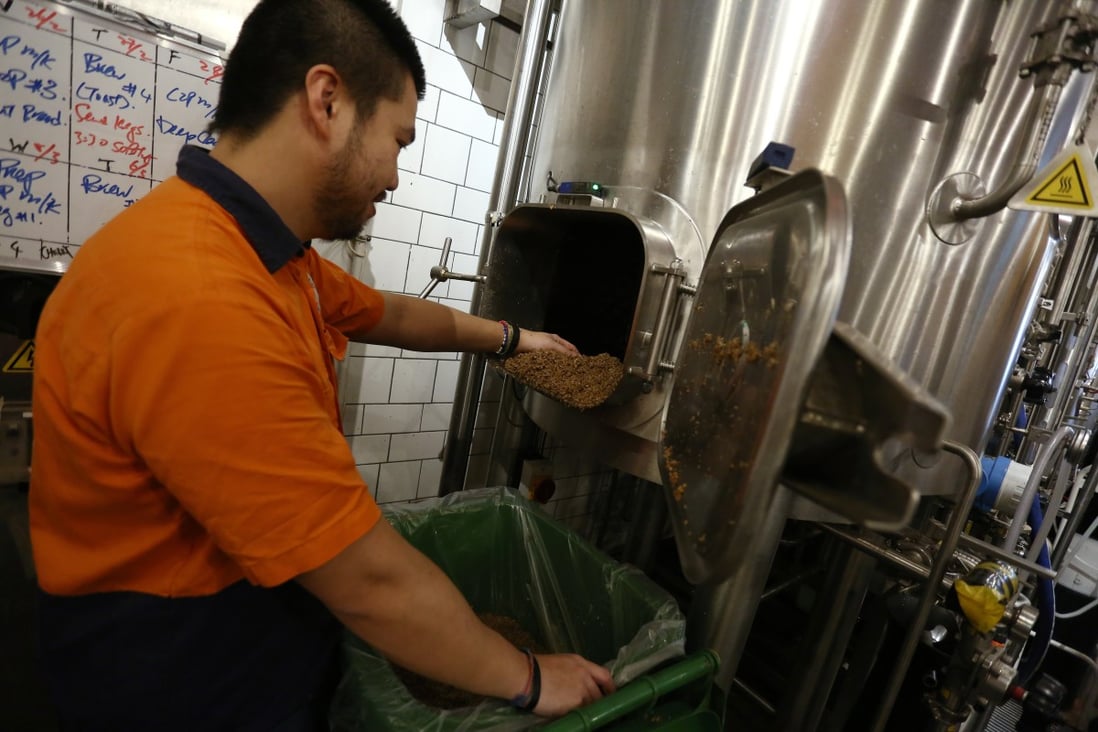 Beer brewer Boris Yeung collects spent grains at Little Creatures Brewing in Kennedy Town, Hong Kong. Since last summer the microbrewery has been sending the discarded grain to Hong Kong Community Composting. Photo: Jonathan Wong