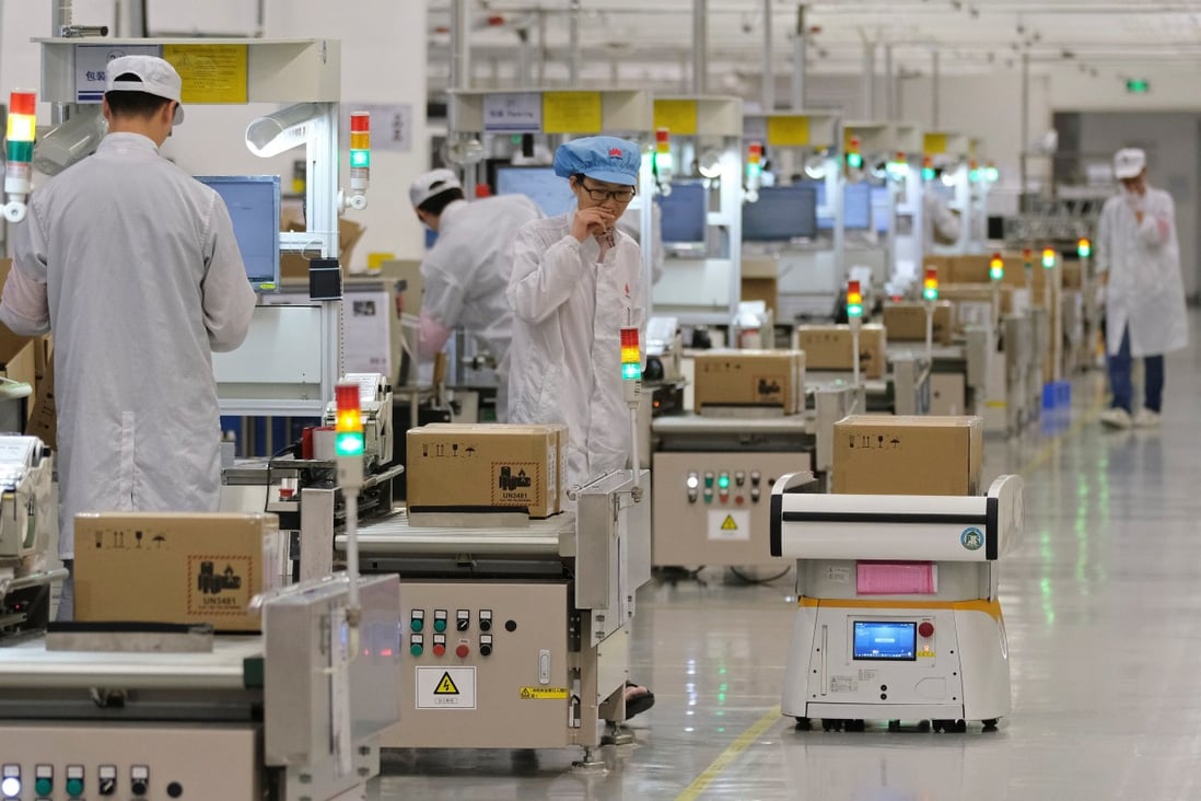 Employees work on a mobile phone production line at a Huawei's factory in China March 25, 2019. Huawei filed 4,411 patent applications last year. Photo: Reuters